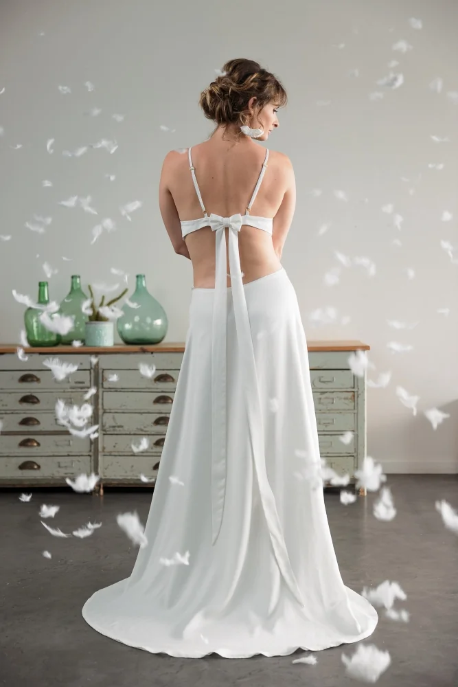 Back view of a wedding gown: Capucine Lemarquier