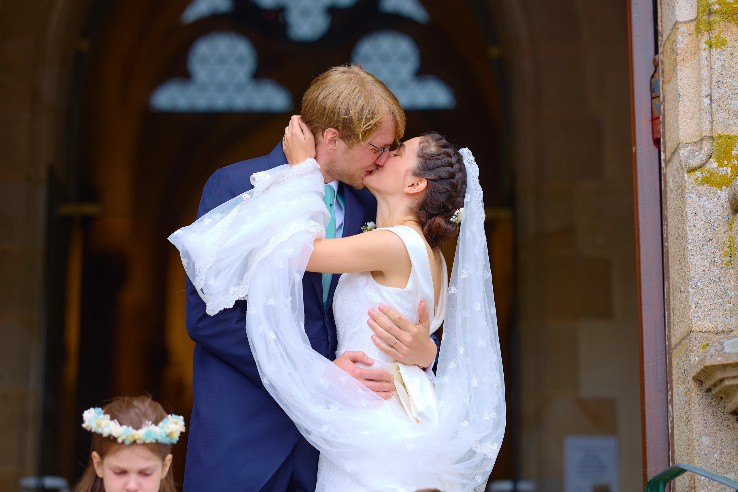 The newlyweds kissing at the end of the ceremony