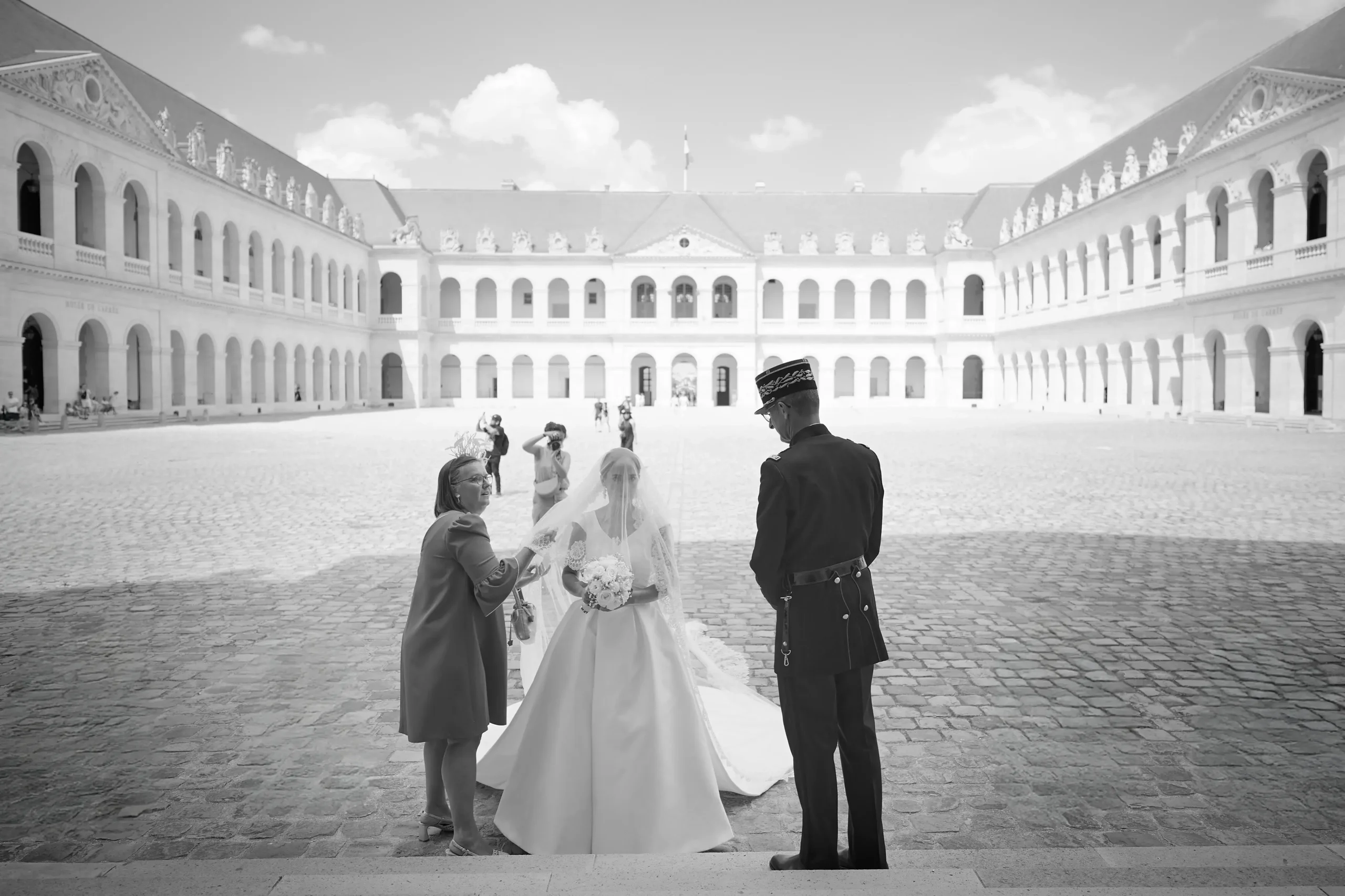 The newlyweds posing in military dress