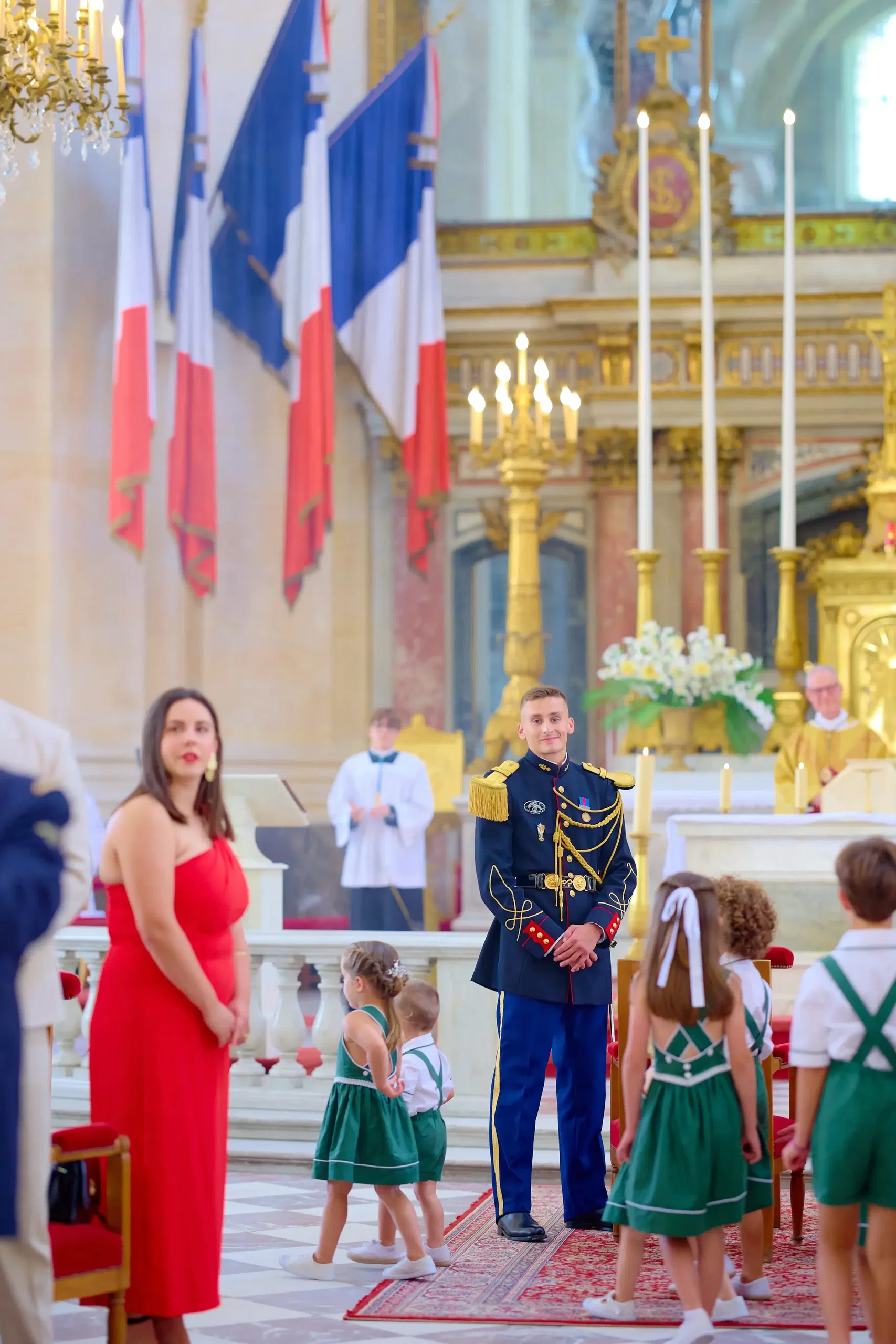 The newlyweds posing in military dress