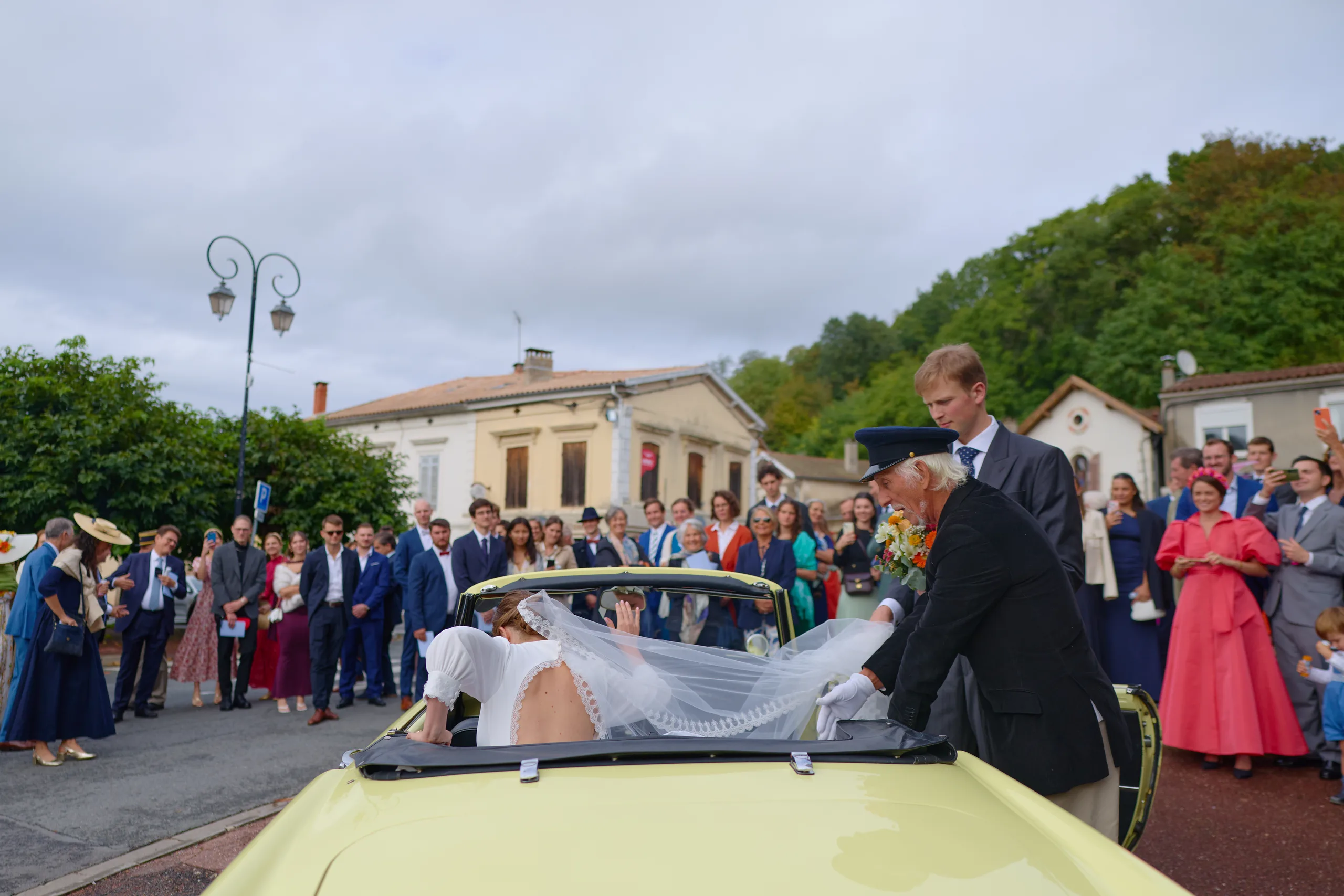 Jade and Luc leaving their wedding ceremony