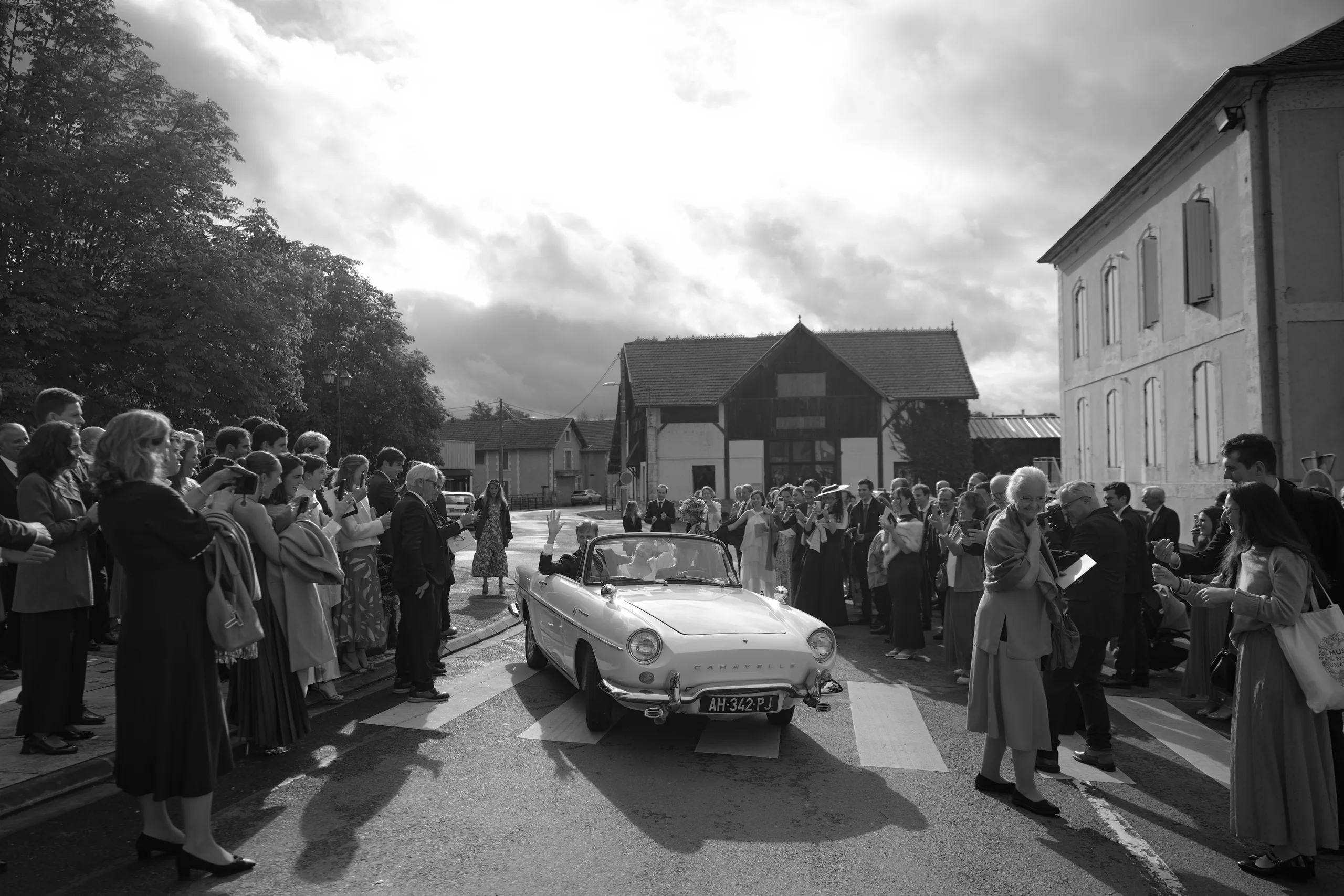 Jade and Luc leaving their wedding ceremony