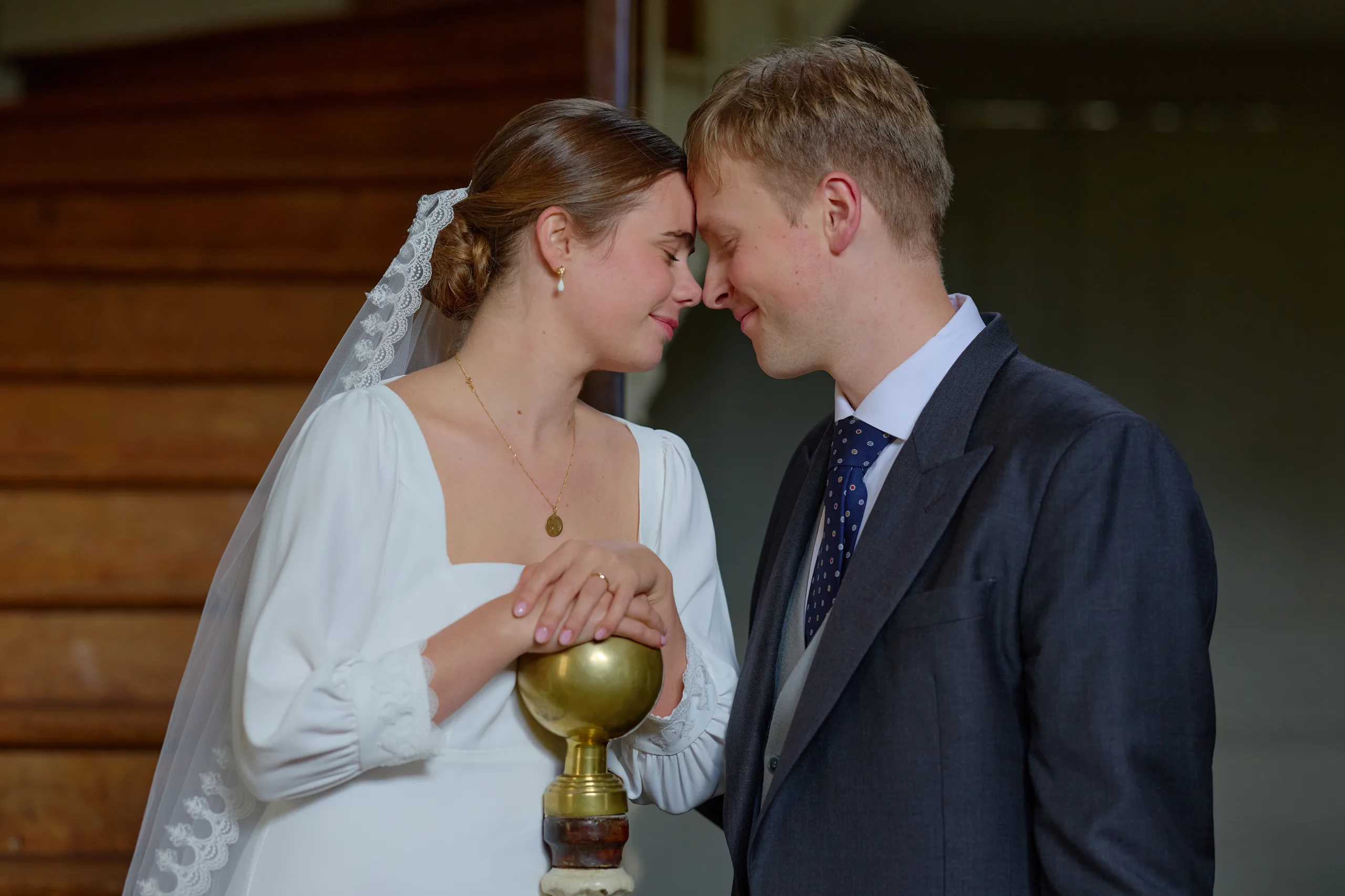 Jade and Luc, their foreheads touching