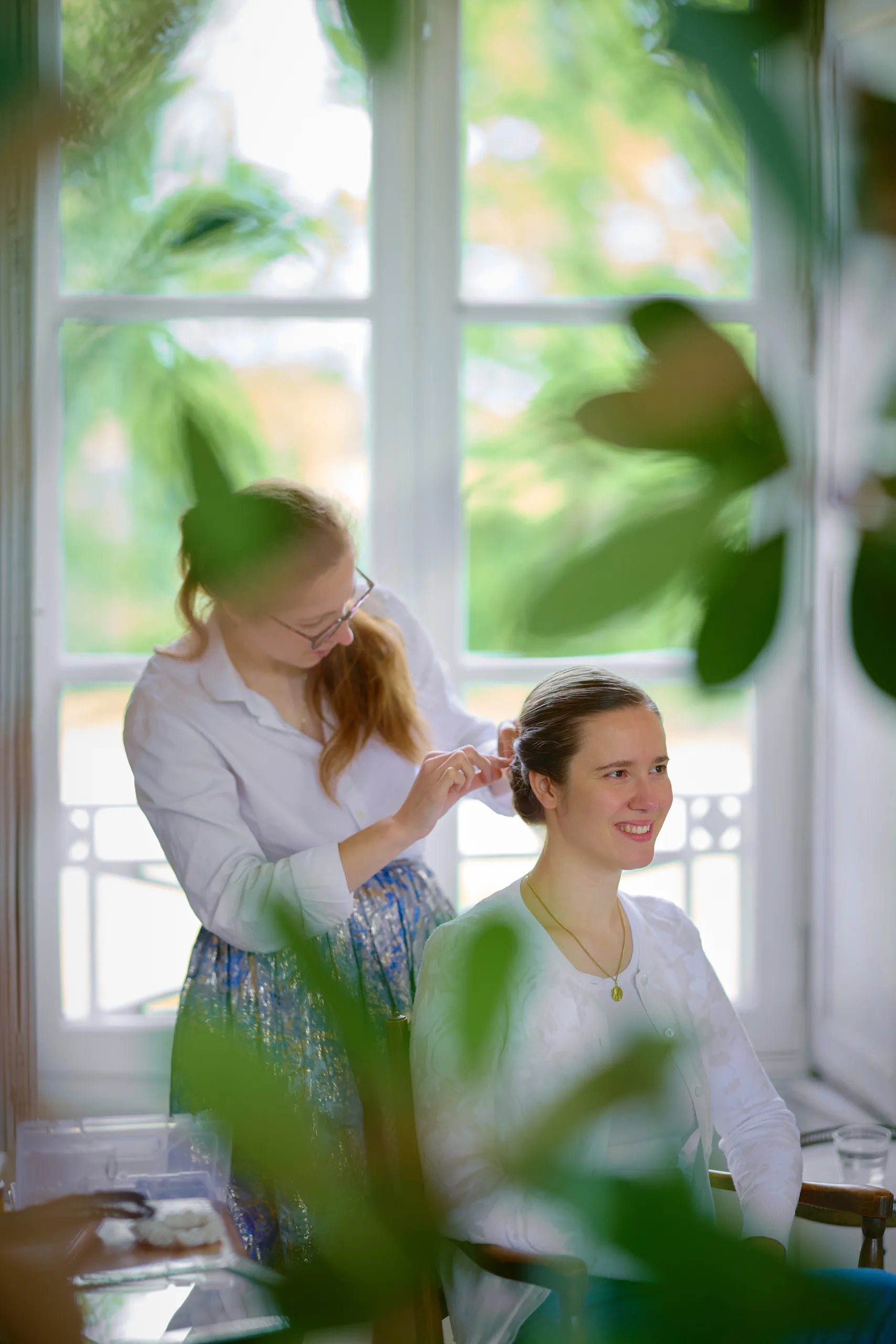 Final touches to the outfit before the ceremony