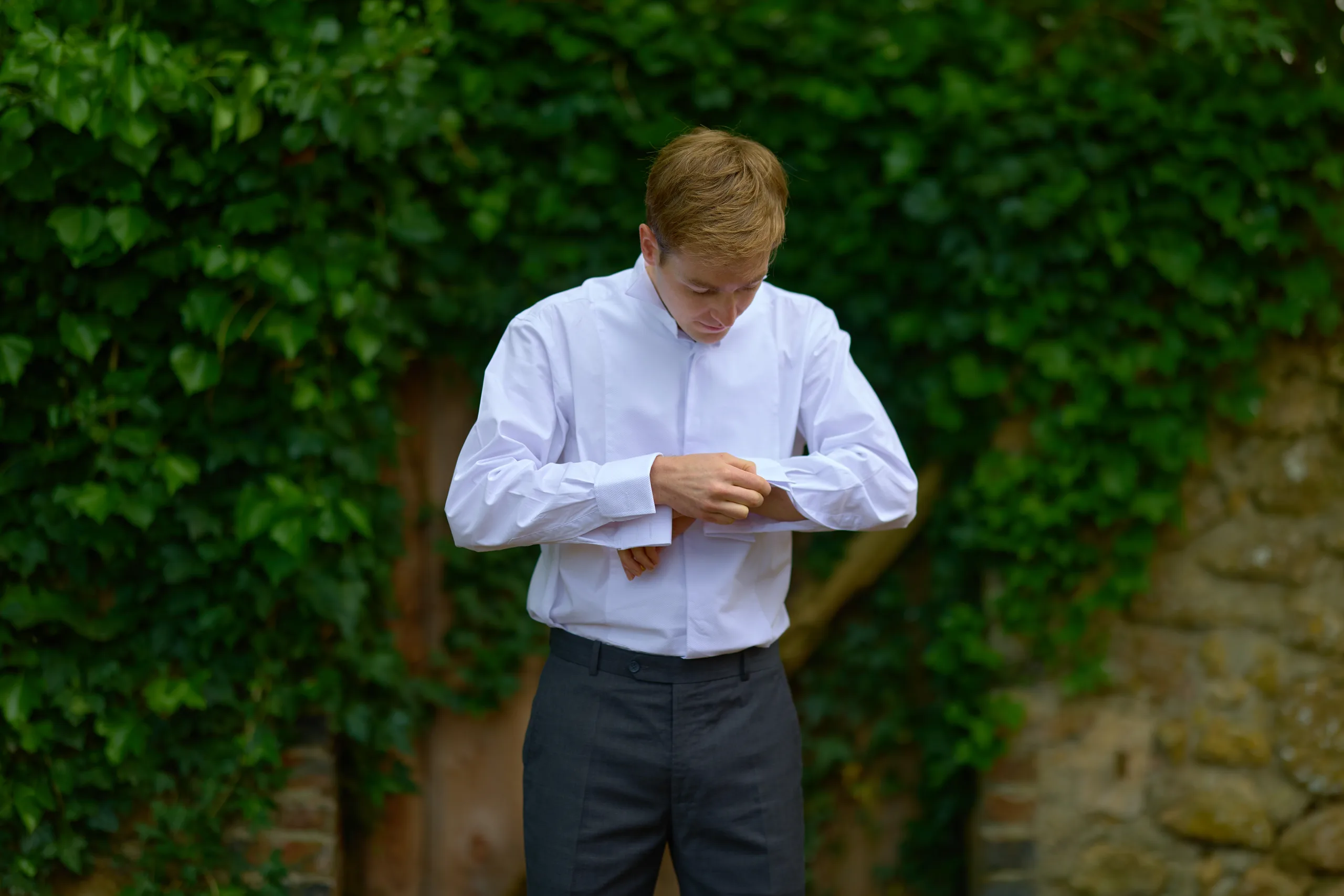 The groom getting ready with his best men